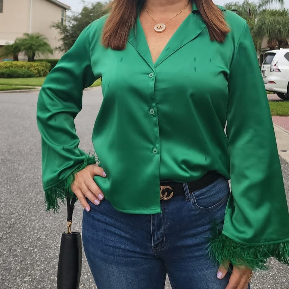 Green blouse with feathers